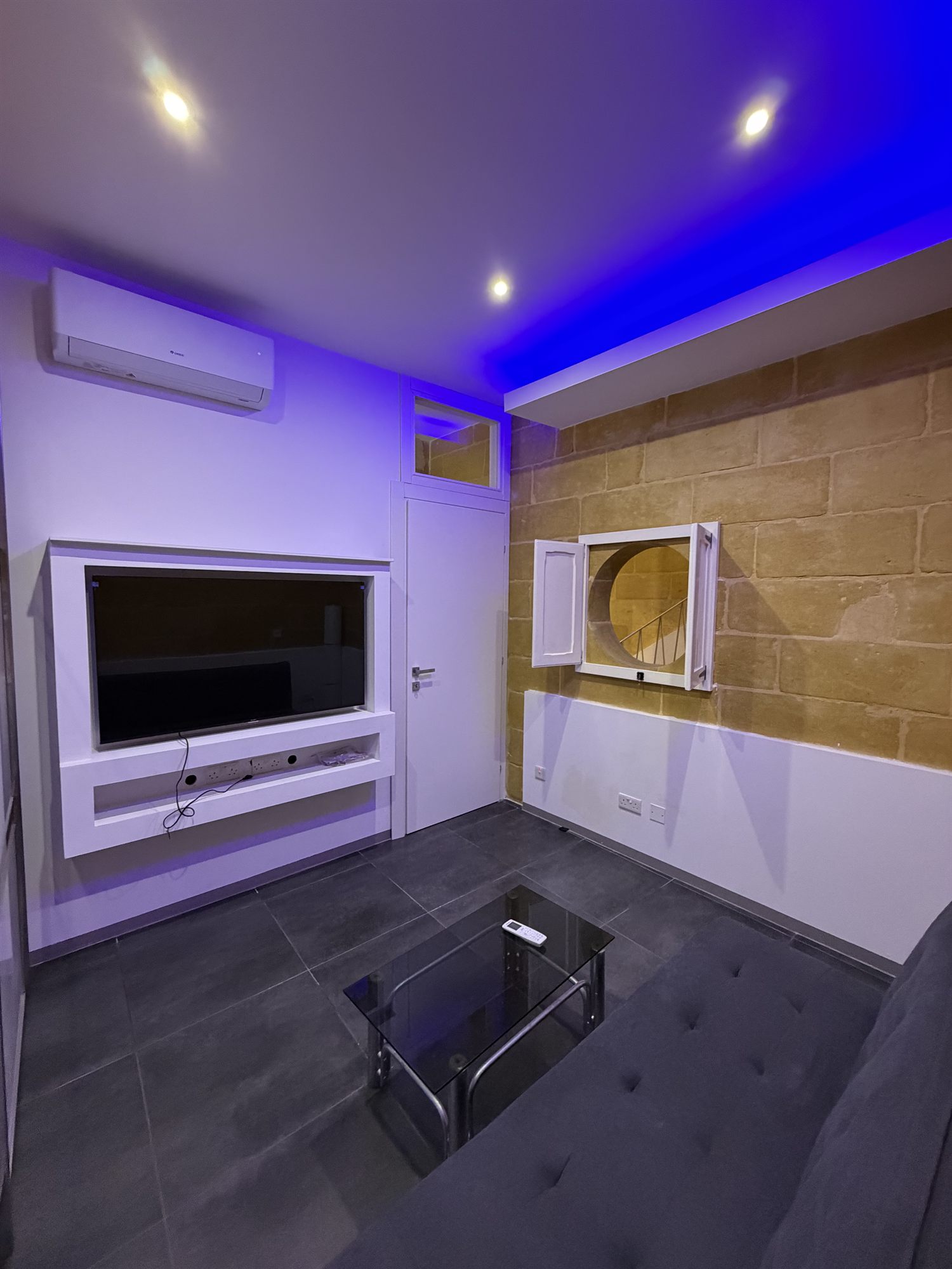 Cardinal Rooftop Townhouse — media room with TV and soundbar